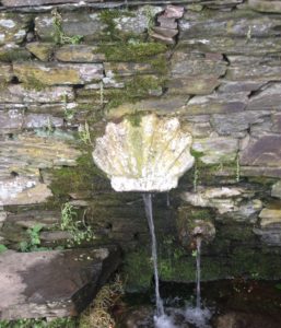 Pilgrim scallop shell fountain in Galicia on the Camino de Santiago